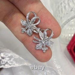1.70Ct Round Simulated Moissanite Bow Knot Stud Earrings 14K White Gold Plated