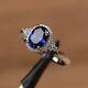 2ct Oval Lab-created Blue Sapphire Halo Engagement Ring 14k White Gold Plated