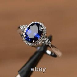 2Ct Oval Lab-Created Blue Sapphire Halo Engagement Ring 14K White Gold Plated