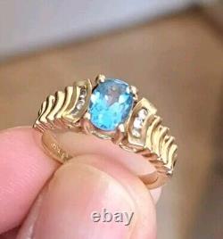 Vintage 1980s 14K Gold Oval Blue Topaz Ring 6 Diamonds