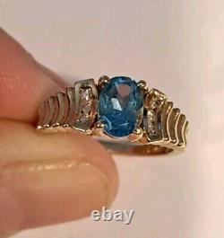 Vintage 1980s 14K Gold Oval Blue Topaz Ring 6 Diamonds