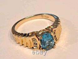 Vintage 1980s 14K Gold Oval Blue Topaz Ring 6 Diamonds